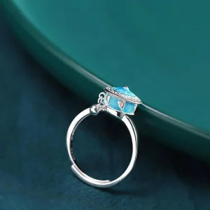Bague porte-bonheur en forme de moulin à prière