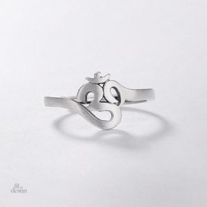 Accessoire spirituel : bague Om pour attirer la chance