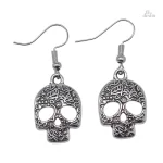 Boucles d'oreilles crânes végétaux porte-bonheur