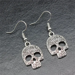 Boucles d'oreilles crâne avec éléments naturels