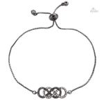 Bijou porte-bonheur avec motif infini intemporel