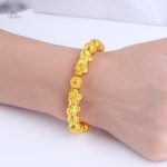 Accessoire traditionnel, bracelet dragon pour attirer la bonne fortune