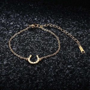 Bijou porte-bonheur en forme de fer à cheval