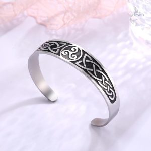 Bracelet en métal avec motif triskel, symbole celte ancien