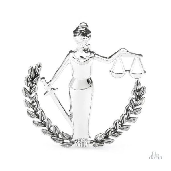 Broche symbolique de justice, glaive et balance