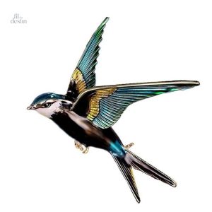 Broche hirondelle porte-bonheur en métal doré