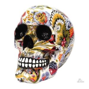 Calavera mexicaine aux motifs floraux colorés