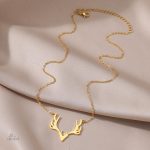 Bijou en bois de cerf, symbole de protection et chance