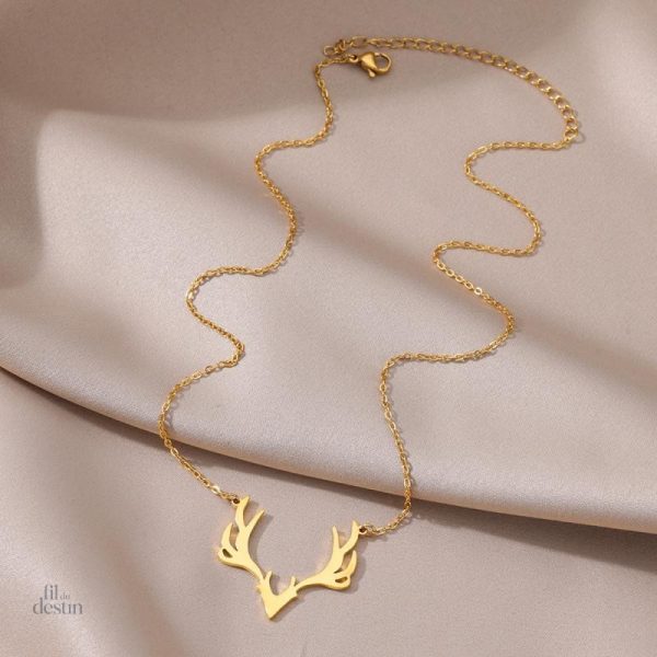 Bijou en bois de cerf, symbole de protection et chance