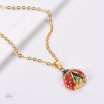 Bijou symbolique coccinelle, collier porte-bonheur