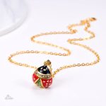 Collier avec petite coccinelle, charme protecteur