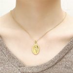 Bijou religieux représentant Notre Dame de Guadalupe