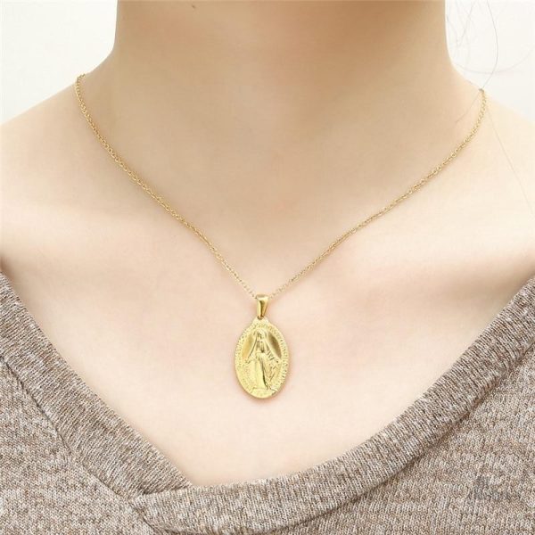Bijou religieux représentant Notre Dame de Guadalupe
