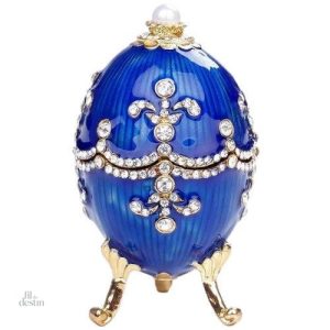 Oeuf Fabergé décoratif bleu, symbole de chance et d'élégance