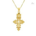 Pendentif croix éthiopienne en métal argenté