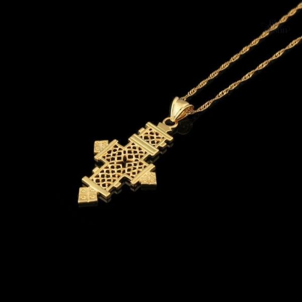 Bijou éthiopien en forme de croix, symbole de protection