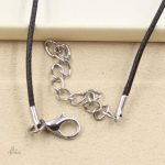 Pendentif stylisé Kokopelli, symbole de chance et d'harmonie