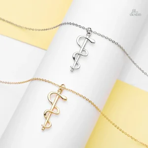 Design de pendentif représentant le bâton d'Asclépios
