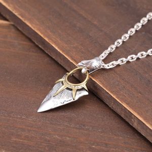 Pendentif en pointe de flèche, symbole de protection