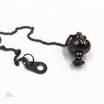 Pendule de radiesthésie avec finition brillante