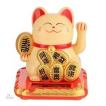 Maneki Neko, porte-bonheur japonais avec un large sourire