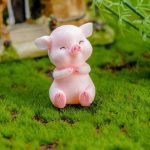 Statue de cochon, cadeau porte-bonheur idéal